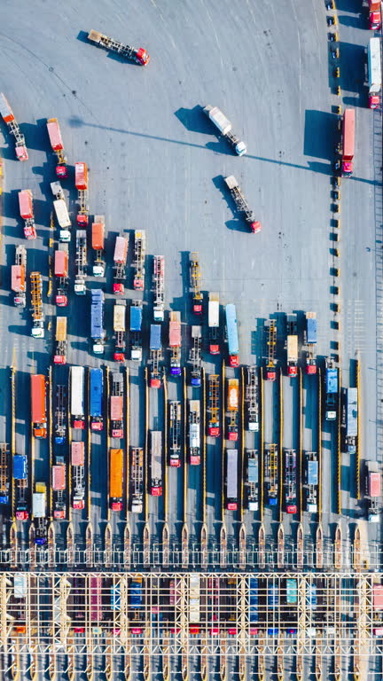 t l aerial view of trucks entering and exiting container ter 3