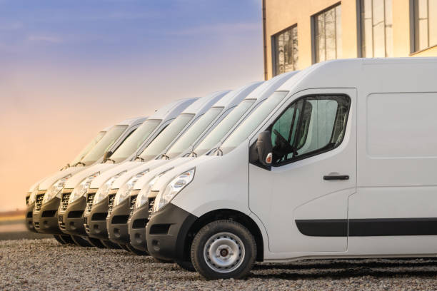 commercial delivery vans in row1140988145
