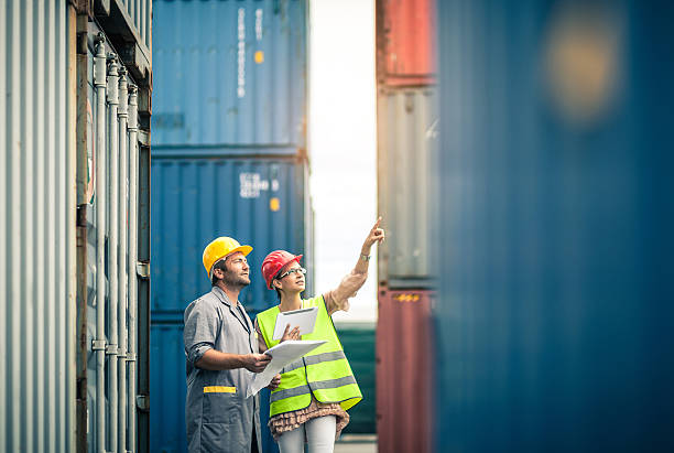 commercial docks worker and inspector at work464899696
