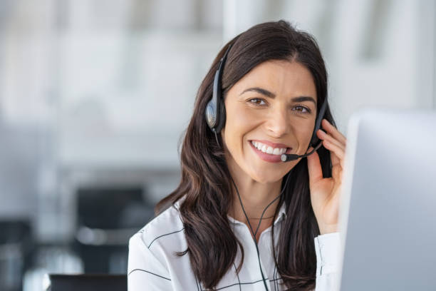 happy smiling woman working in call center1189301932
