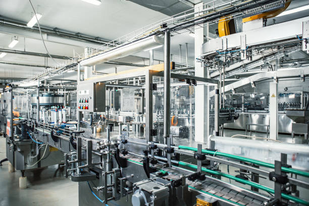 industrial factory interior with equipment conveyor line and steel tools industry background1157027831